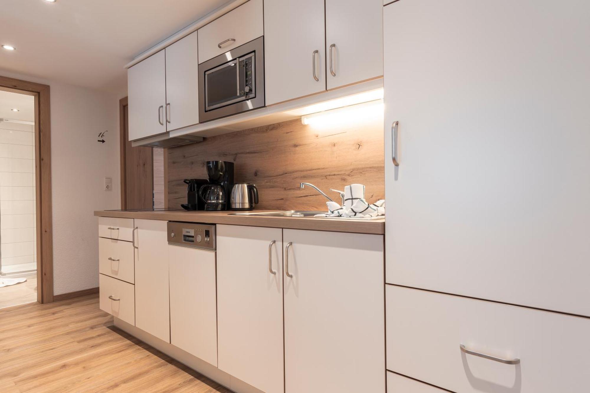 Schmid Rooms & Apartments Ишгль Экстерьер фото
