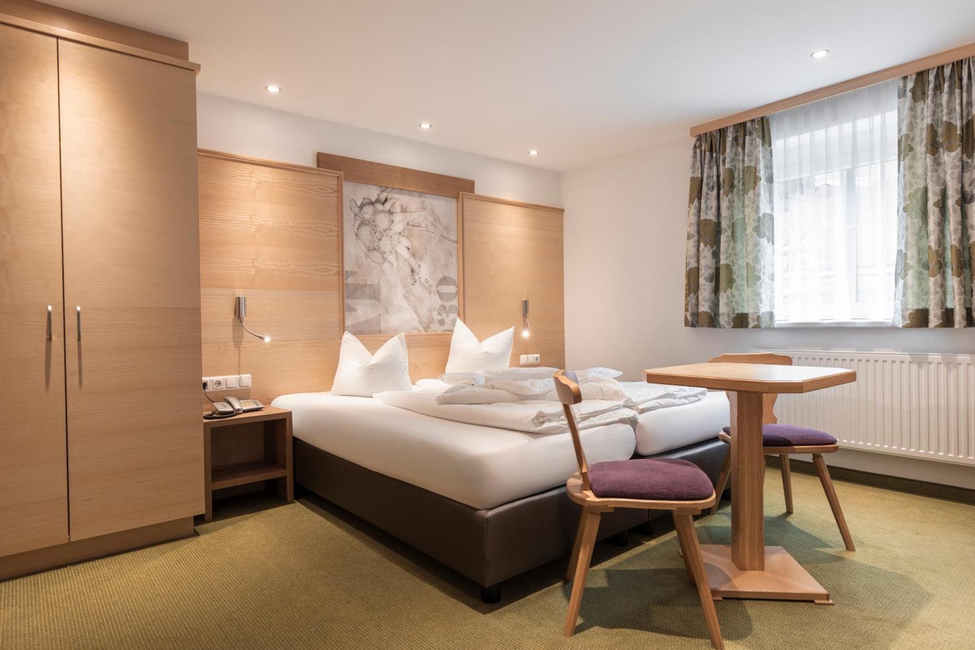 Schmid Rooms & Apartments Ишгль Экстерьер фото